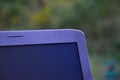 A laptop on the garden table