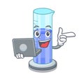 With laptop graduated cylinder with on mascot liquid