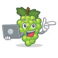 With laptop green grapes character cartoon
