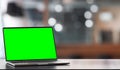 Laptop green screen, background green.