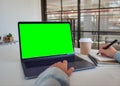 Laptop green screen, background green.