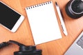 Office table accessories on wooden background