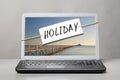 Laptop with holiday note Royalty Free Stock Photo