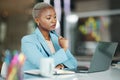 Laptop, idea and a serious business black woman in her office on a review, proposal or project. Work, focus and thinking Royalty Free Stock Photo