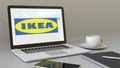 Laptop with Ikea logo on the screen. Modern workplace conceptual editorial 3D rendering