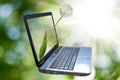 Laptop image on a green background. Royalty Free Stock Photo