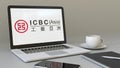 Laptop with Industrial and Commercial Bank of China ICBC logo on the screen. Modern workplace conceptual editorial 3D