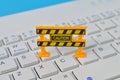 Laptop keyboard with caution sign. Maintenance, repair, under construction and safety concept