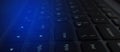 Laptop, keyboard close-up, neon light. Royalty Free Stock Photo