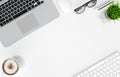 Laptop, keyboard, coffee cup, glasses, pen and pencil on white office desk table, top view, copy space, 3d rendering Royalty Free Stock Photo