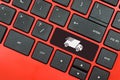 Laptop keyboard with delivery truck symbol. Transportation and courier logistics shipping service