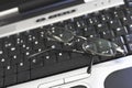 Laptop keyboard with glasses