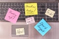 Laptop keyboard with motivational sticky notes. Royalty Free Stock Photo