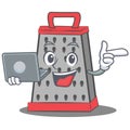 With laptop kitchen grater character cartoon