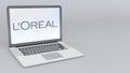 Laptop with L`Oreal logo. Computer technology conceptual editorial 3D rendering