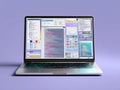 Laptop on light gray background, screen displaying colorful code snippets and app UI elements, modern design with visible vents Royalty Free Stock Photo