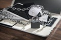 Laptop locked with chains and padlock