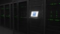 Laptop with the logo of GOLDMAN SACHS on the screen in a server room. Conceptual editorial 3d rendering