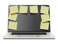 Laptop with a lot of yellow stick notes