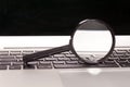 Laptop With Magnifying Glass