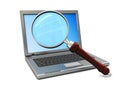 Laptop and magnigy glass