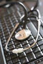 Laptop and medical tool Royalty Free Stock Photo