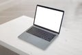 Laptop mockup on clean office desk close-up Royalty Free Stock Photo