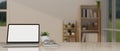 A laptop mockup on a tabletop in a minimal cozy living room. workspace close-up image Royalty Free Stock Photo