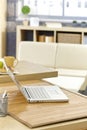 Laptop on morning table Royalty Free Stock Photo