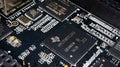 Laptop motherboard closeup electronic components circuit board background