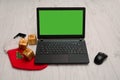 Laptop, mouse, phone and Christmas decorations, Desk Royalty Free Stock Photo