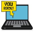 Laptop or notebook computer, business concept with text You Rock