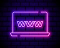 Laptop or notebook computer icon. Colour neon style on dark brick wall background. Light icon