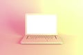 Laptop or notebook computer with white screen illuminated by bright gradient holographic lights of pink yellow colors. Creative Royalty Free Stock Photo