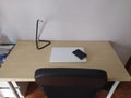 A laptop on a desk ready to telecommute