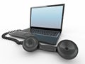 Laptop with old-fashioned phone reciever Royalty Free Stock Photo