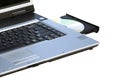 Laptop with opened DVD rewriter and a disc. Royalty Free Stock Photo