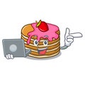 With laptop pancake with strawberry character cartoon