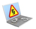 Laptop with paragraph sign and handcuffs