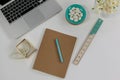 Laptop, pearl necklace, ruler, pen, diary and pebbles Royalty Free Stock Photo