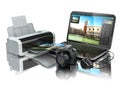 Laptop, photo camera and printer. Preparing images for print. Royalty Free Stock Photo