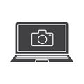 Laptop photocamera glyph icon