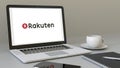 Laptop with Rakuten logo on the screen. Modern workplace conceptual editorial 3D rendering