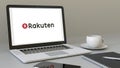 Laptop with Rakuten logo on the screen. Modern workplace conceptual editorial 3D rendering Royalty Free Stock Photo