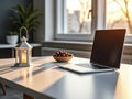 Laptop with Ramadan Lantern and Dates on White Desk in Sunlit Room Royalty Free Stock Photo