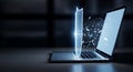 Laptop screen shattering into digital fragments against dark background Royalty Free Stock Photo