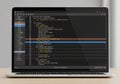 Laptop screen displaying code editor with Royalty Free Stock Photo