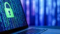 Laptop screen displaying digital padlock icon on blue binary code background representing cyber security data protection and safe Royalty Free Stock Photo