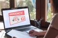 Emergency concept on a laptop screen Royalty Free Stock Photo