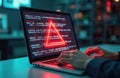 Laptop screen displays error alert. Red warning triangle, data code, cybersecurity, hacker attack concept. Person types, network Royalty Free Stock Photo